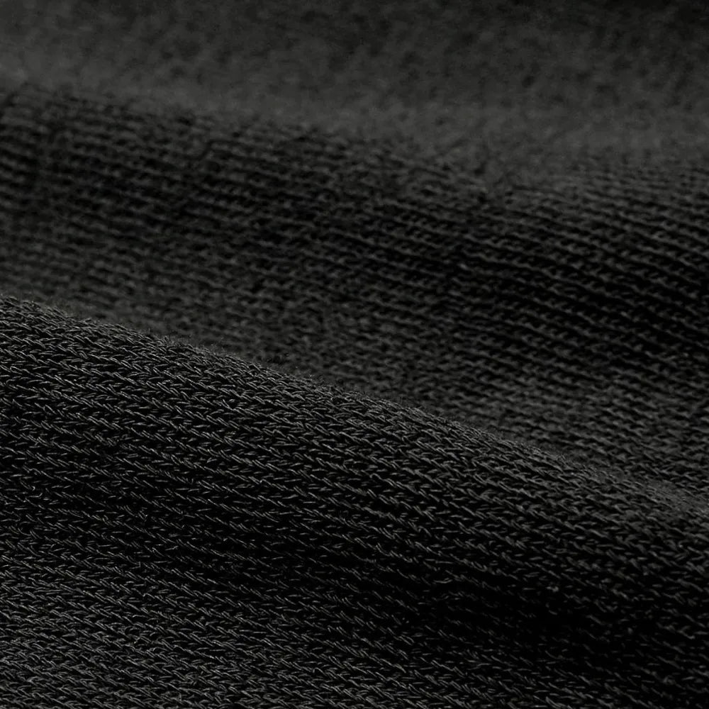 Close-up of the ice cotton knit fabric showing its cool-touch texture, tight weave, and charcoal grey coloration.