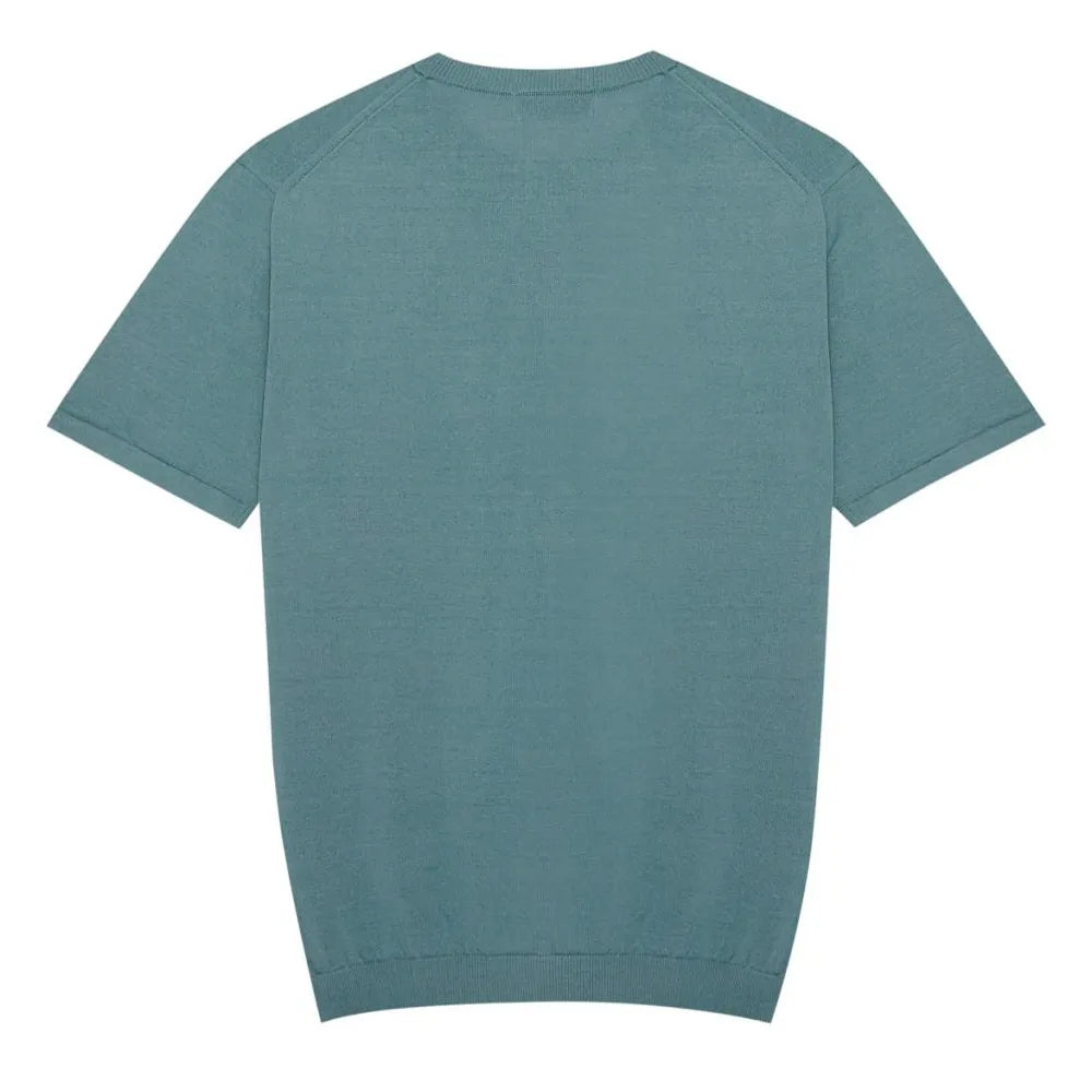 Back view of the Mooncastle Ice Cotton Knit Tee Mist Green highlighting the smooth knit surface and minimal construction.