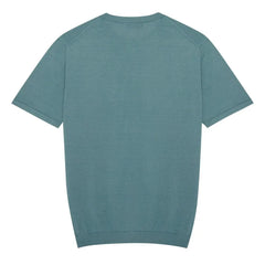Back view of the Mooncastle Ice Cotton Knit Tee Mist Green highlighting the smooth knit surface and minimal construction.