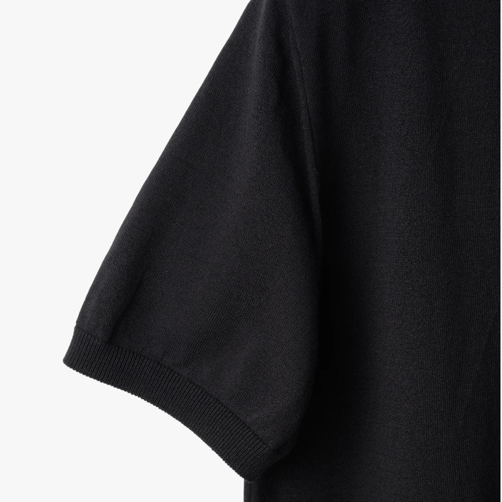 Close-up of the sleeve showing the Ice Cotton knit texture and clean finishing.