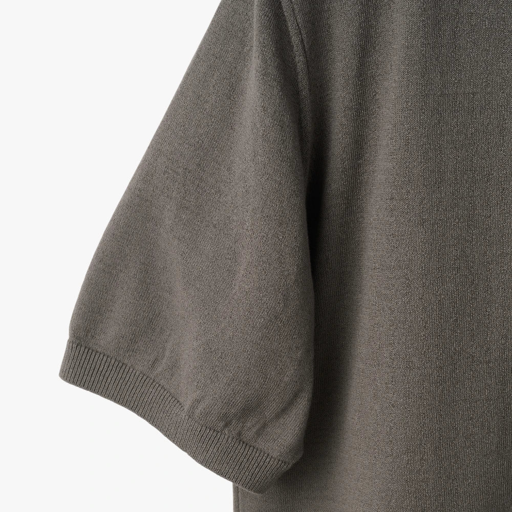 Close-up of the sleeve showing the Ice Cotton knit texture and clean finishing.