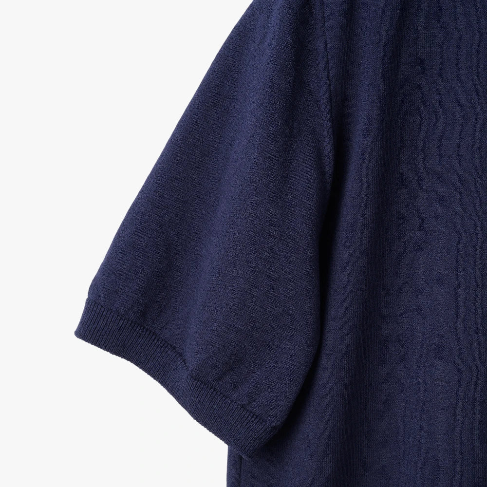 Close-up of the sleeve showing the Ice Cotton knit texture and clean finishing.