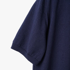 Close-up of the sleeve showing the Ice Cotton knit texture and clean finishing.