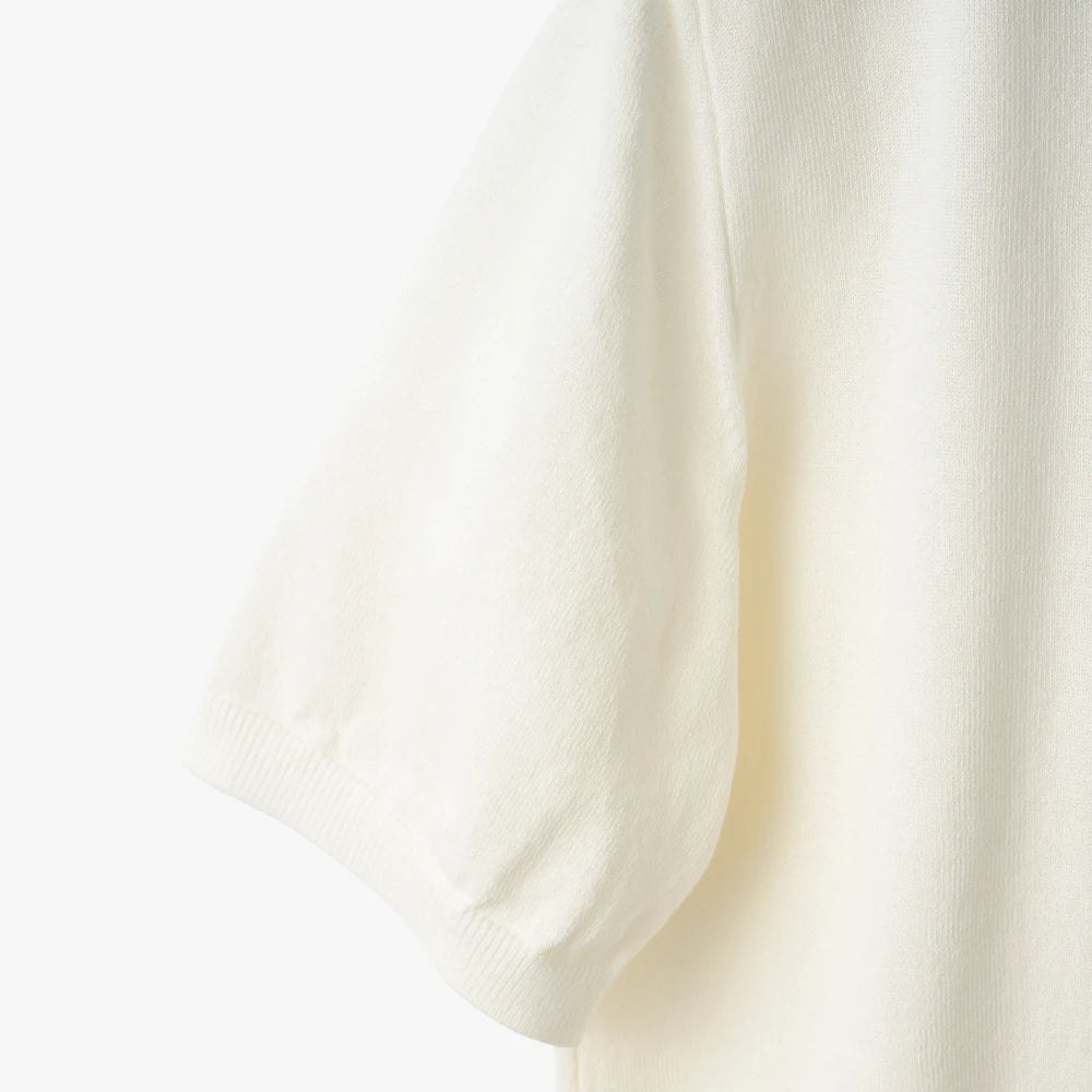 Close-up of the sleeve showing the Ice Cotton knit texture and clean finishing.