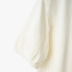 Close-up of the sleeve showing the Ice Cotton knit texture and clean finishing.