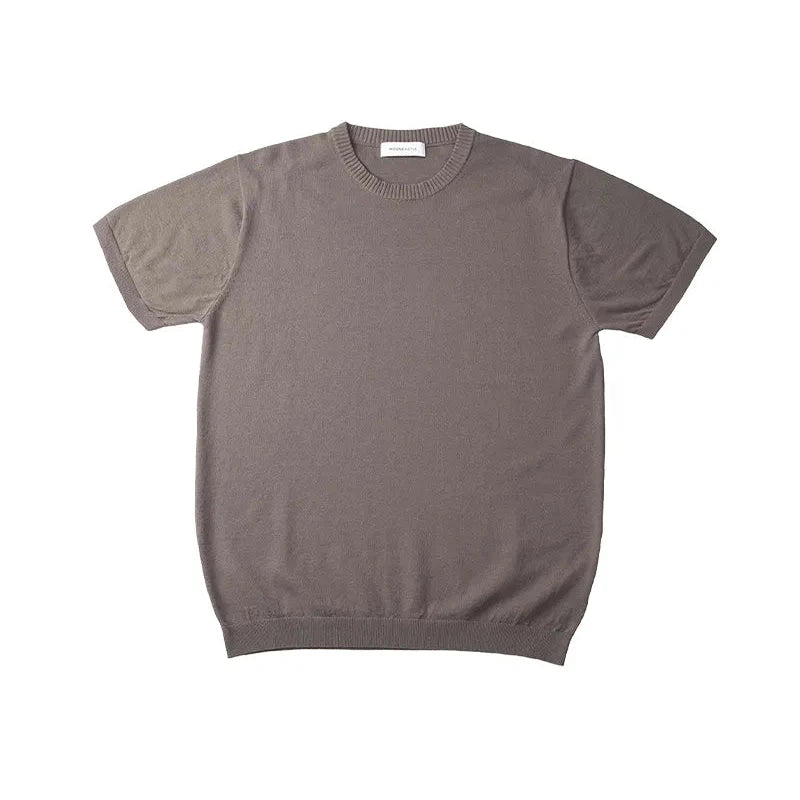 Front view of the Mooncastle Knit Crew Neck Charcoal showing the classic silhouette, deep charcoal tone, and refined crew neck design.