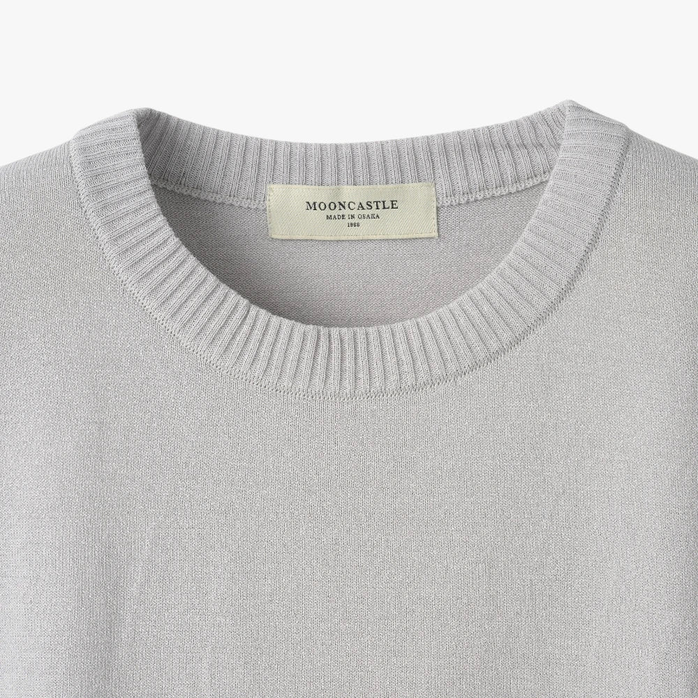 Close-up of the crew neck collar highlighting the ribbed knit construction and clean finishing.