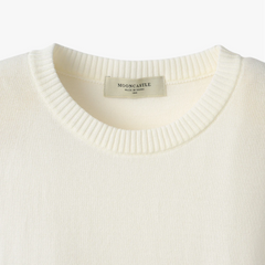 Close-up of the crew neck collar highlighting the ribbed knit construction and clean finishing.