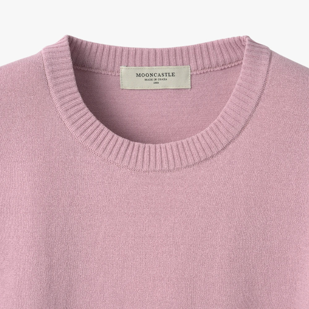 Close-up of the crew neck collar highlighting the ribbed knit construction and clean finishing.