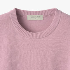 Close-up of the crew neck collar highlighting the ribbed knit construction and clean finishing.