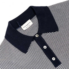 Close-up of the polo collar highlighting the knit collar and stripe pattern detail.