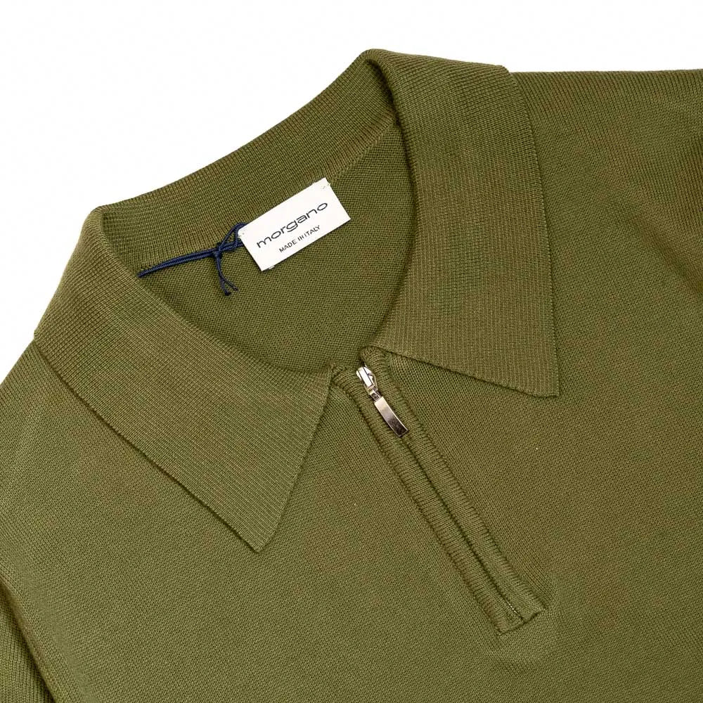 Close-up of the zip polo collar highlighting the metal zip and structured knit collar.