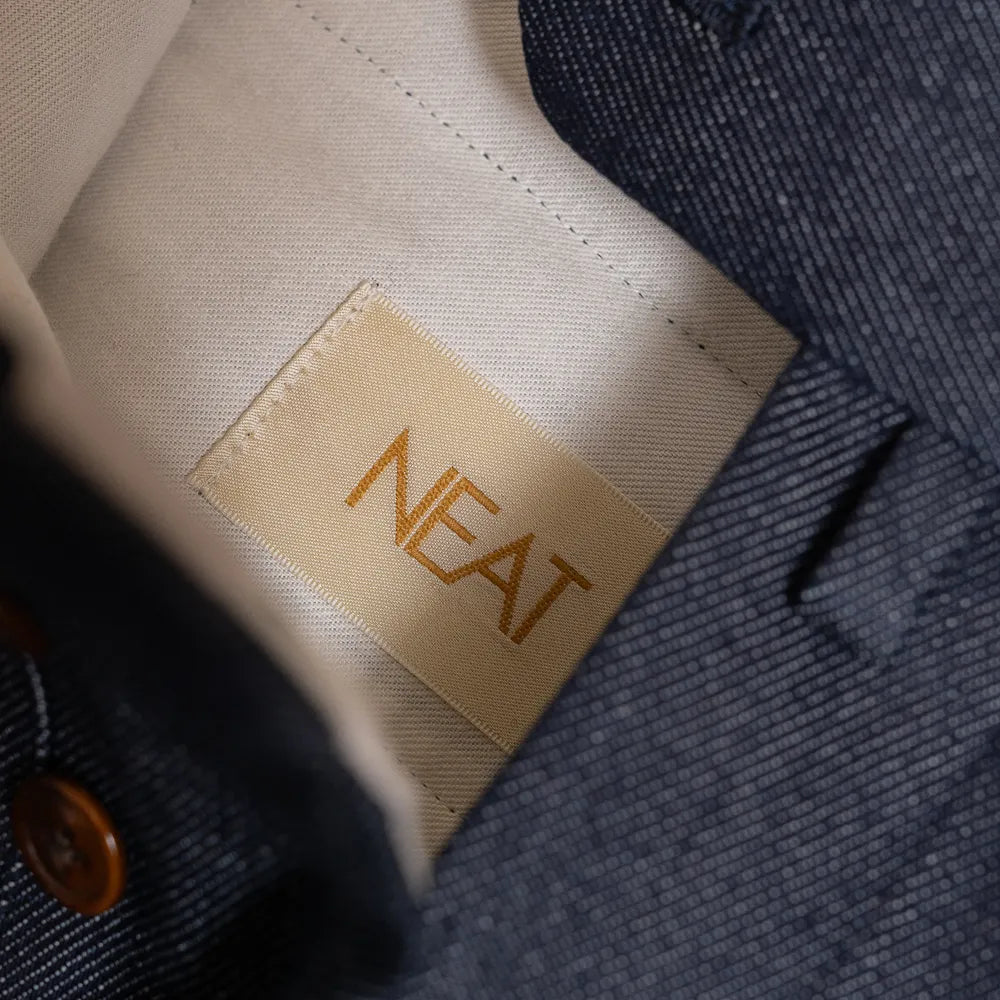 Close-up of the NEAT for Refinement interior label.