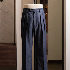 Front view of Neat Denim for Refinement in indigo featuring a clean tailored silhouette and straight leg fit.
