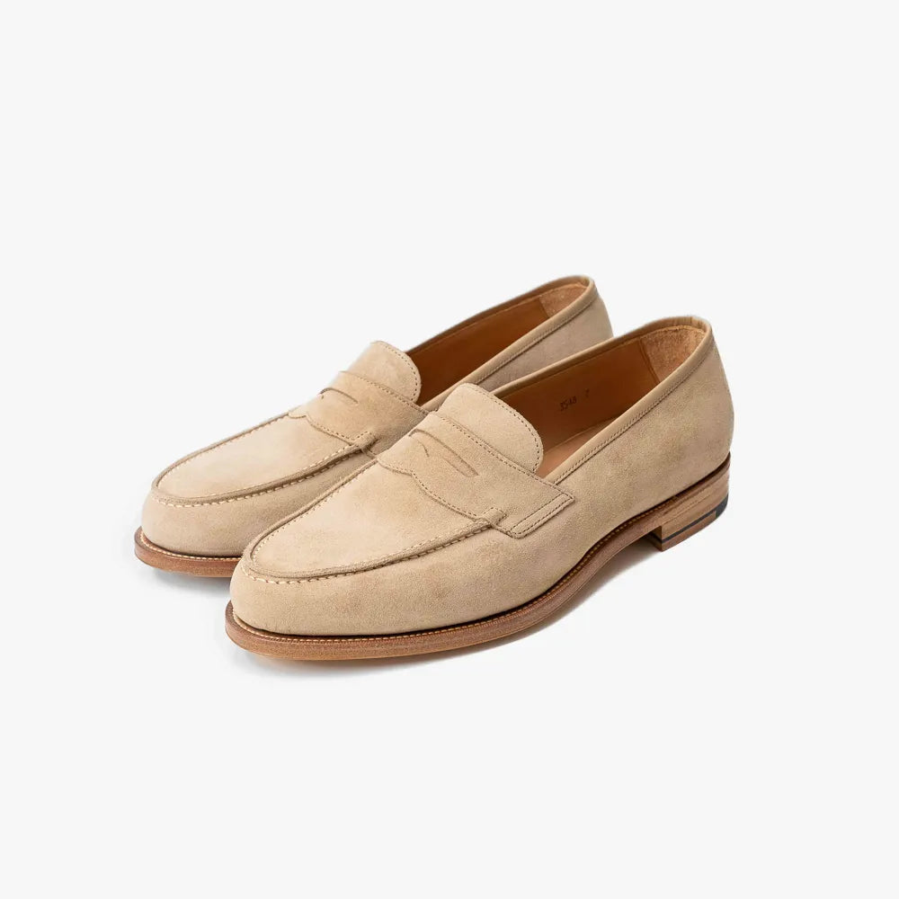 Oriental Albers Penny Loafer in beige suede, angled front view showing soft texture and strap.