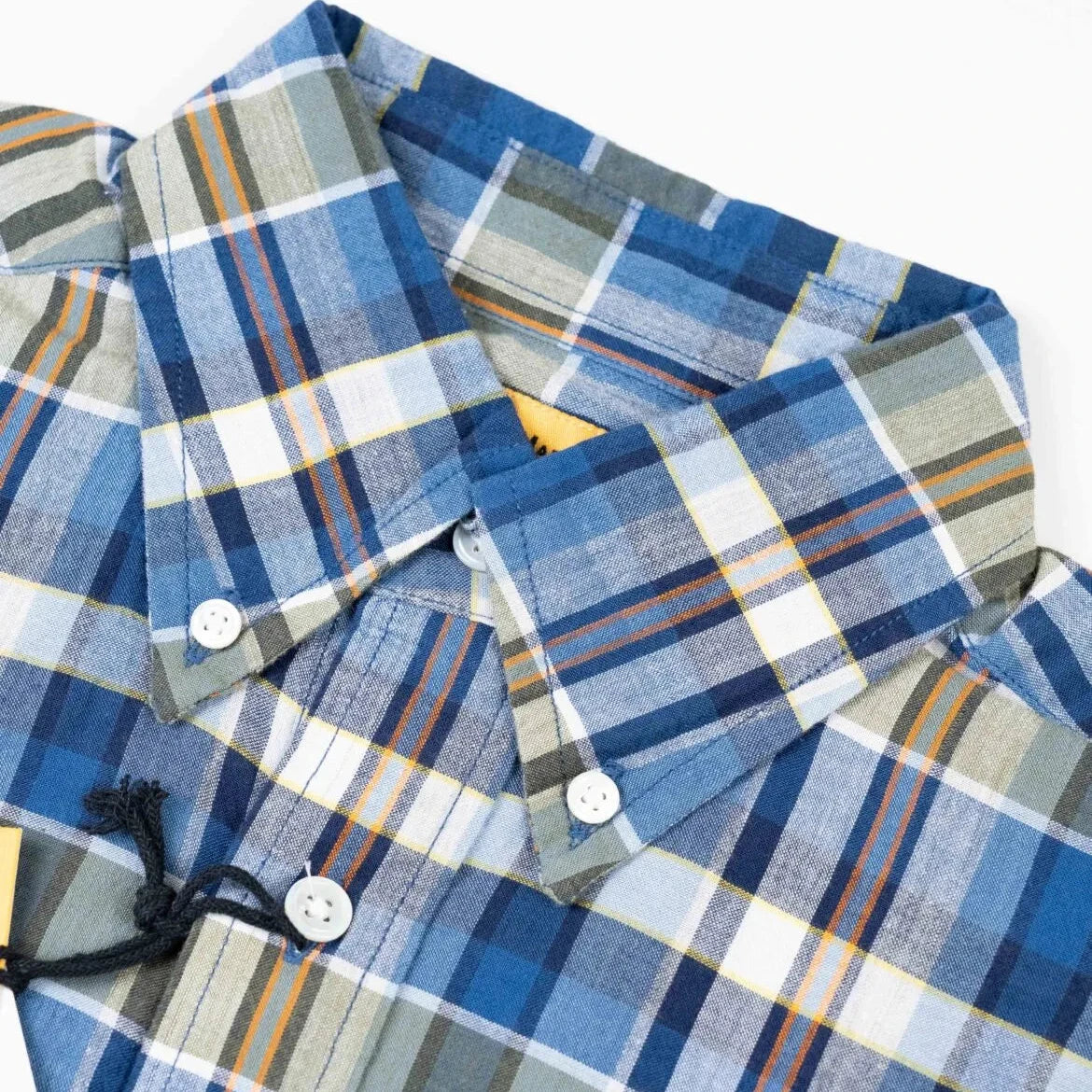 Close-up of the button-down collar on the Original Madras N5 Shirt Blue showing the collar roll, stitching, and handwoven Madras weave.