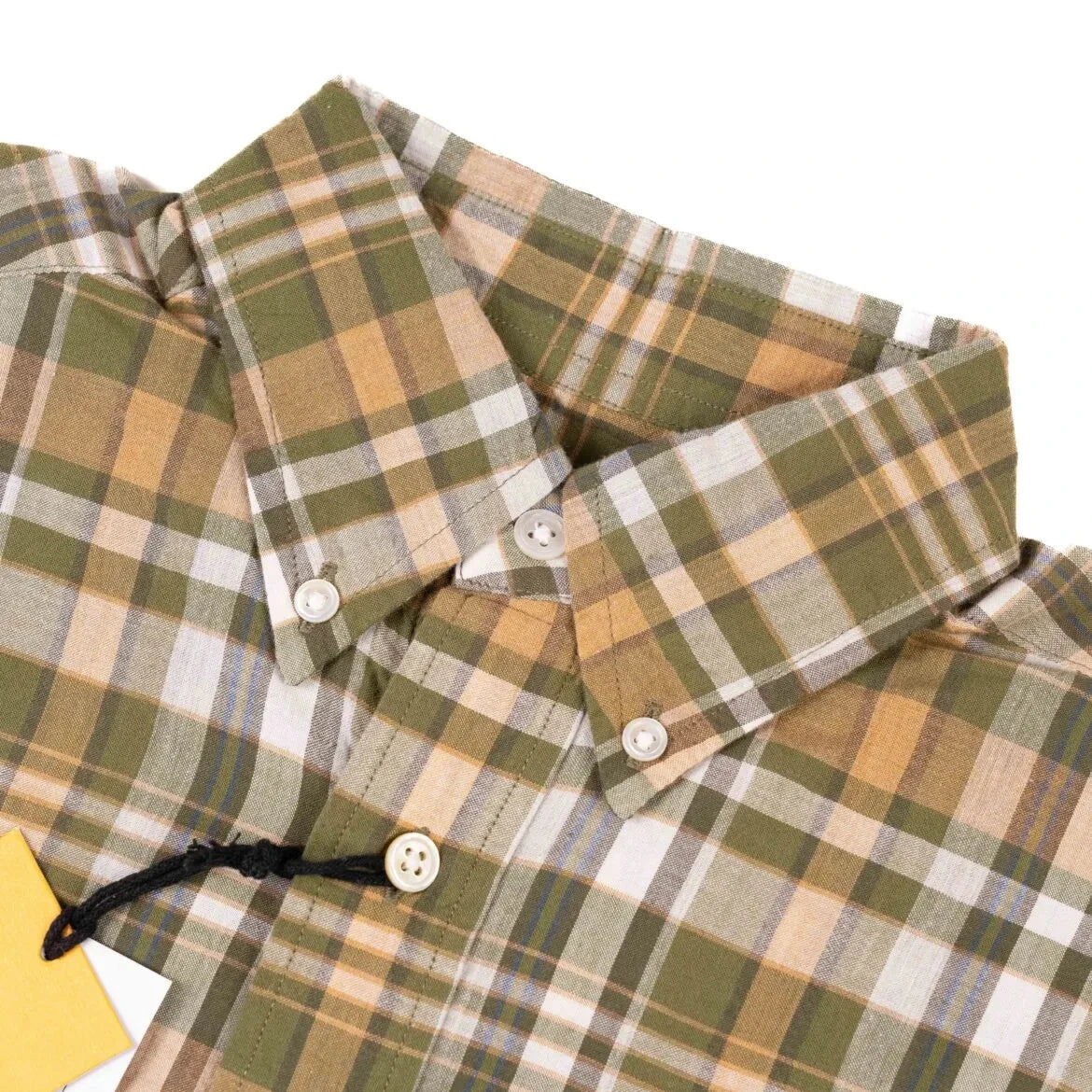 Close-up of the button-down collar on the Original Madras N5 Shirt Green Yellow showing the collar roll, stitching, and handwoven Madras weave.