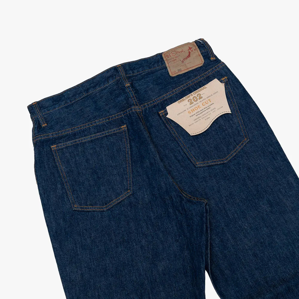 Close-up of the Japanese one-wash denim showing texture and weave.
