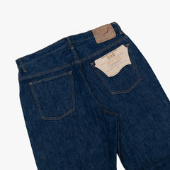 Close-up of the Japanese one-wash denim showing texture and weave.

