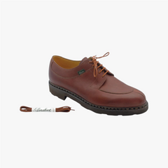 Close-up of the brown shoelace texture showing weave detail and durable construction.