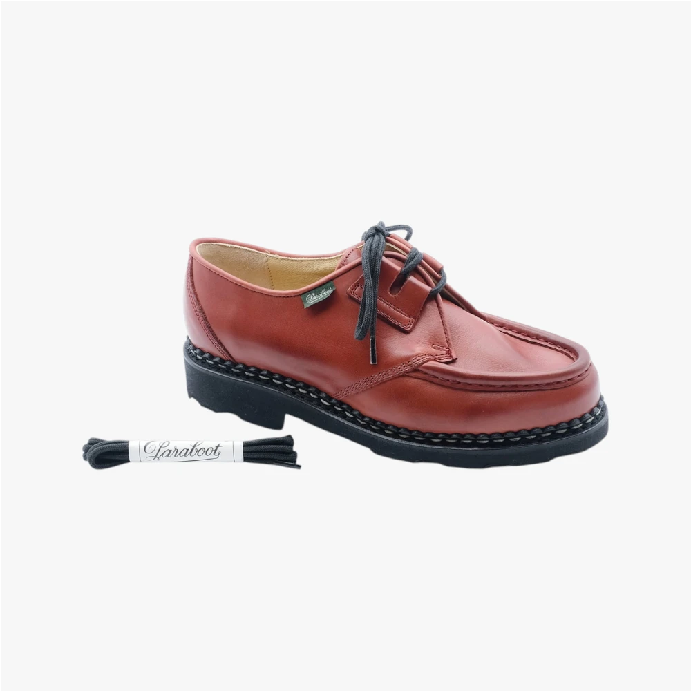 Close-up of the black round shoelace texture showing weave detail and durable construction.