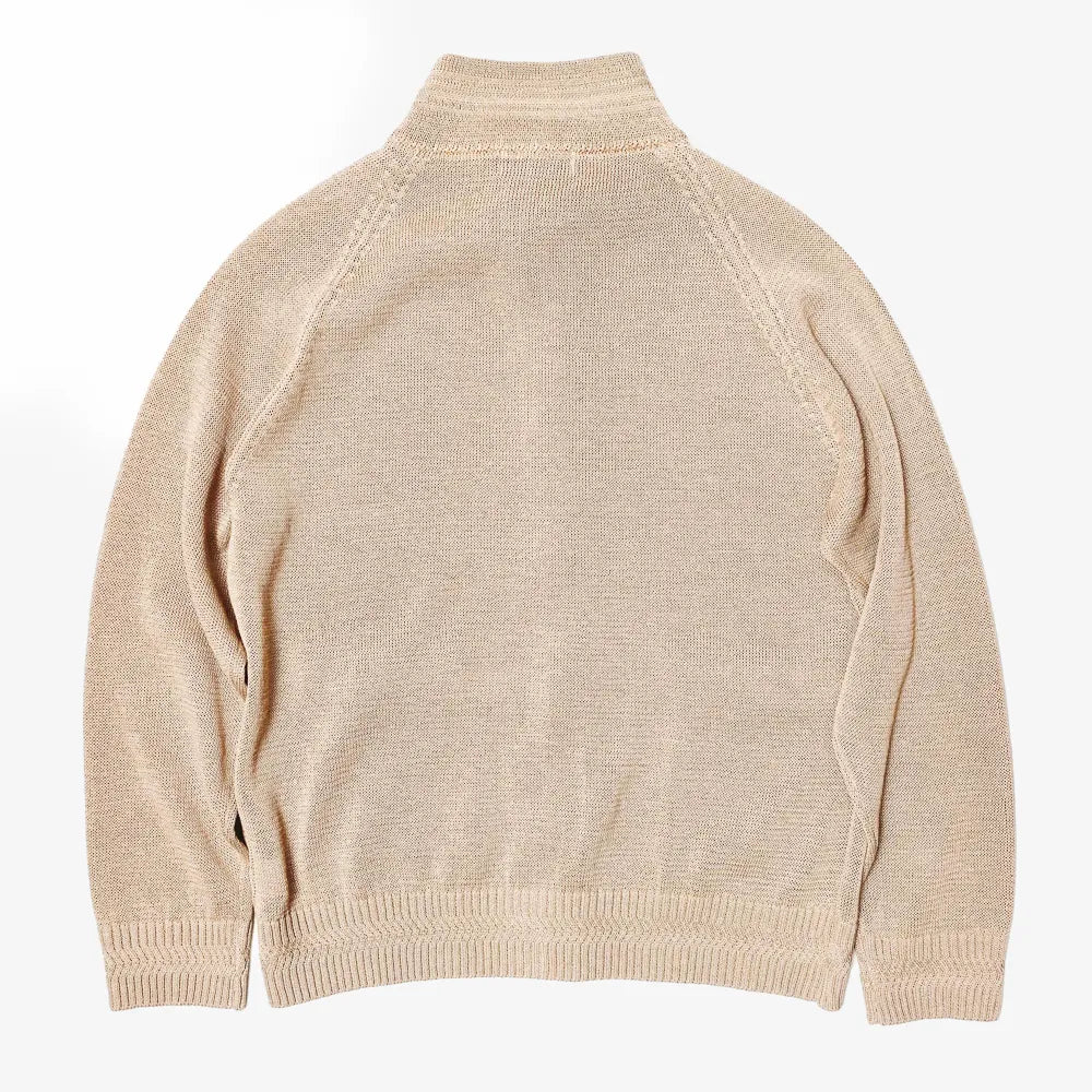 Back view highlighting the raglan sleeve construction and smooth knit structure.