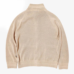 Back view highlighting the raglan sleeve construction and smooth knit structure.