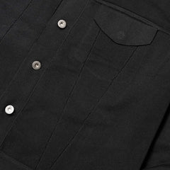 Close-up of the front pockets showing knit structure, pocket opening, and clean finishing.
