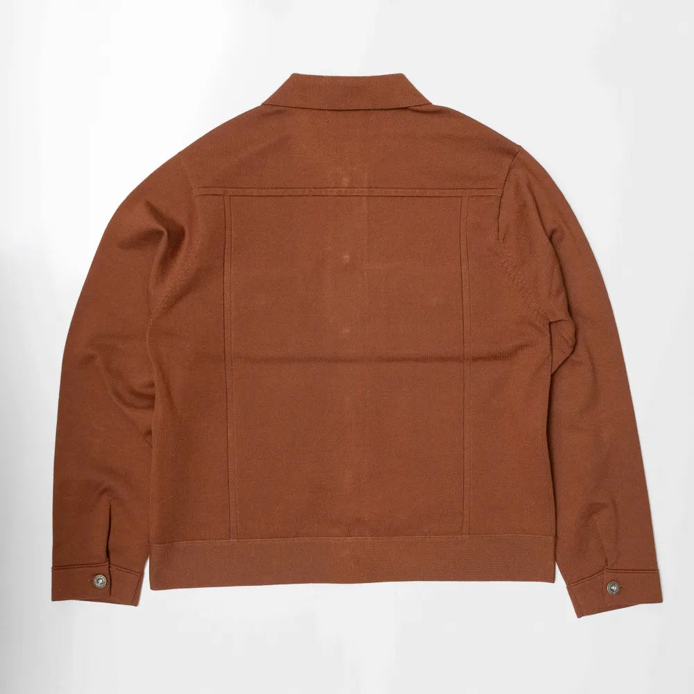Back view of the brown knit trucker jacket highlighting smooth knit construction, clean back panel, and refined shaping.