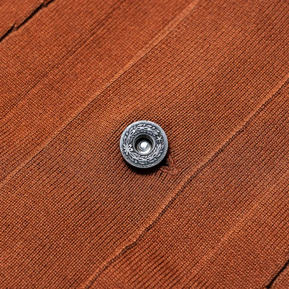 Close-up of the button on the Refinement Knitwear Essential Trucker Jacket Brown showing hardware texture, button stitching, and knit placket construction.