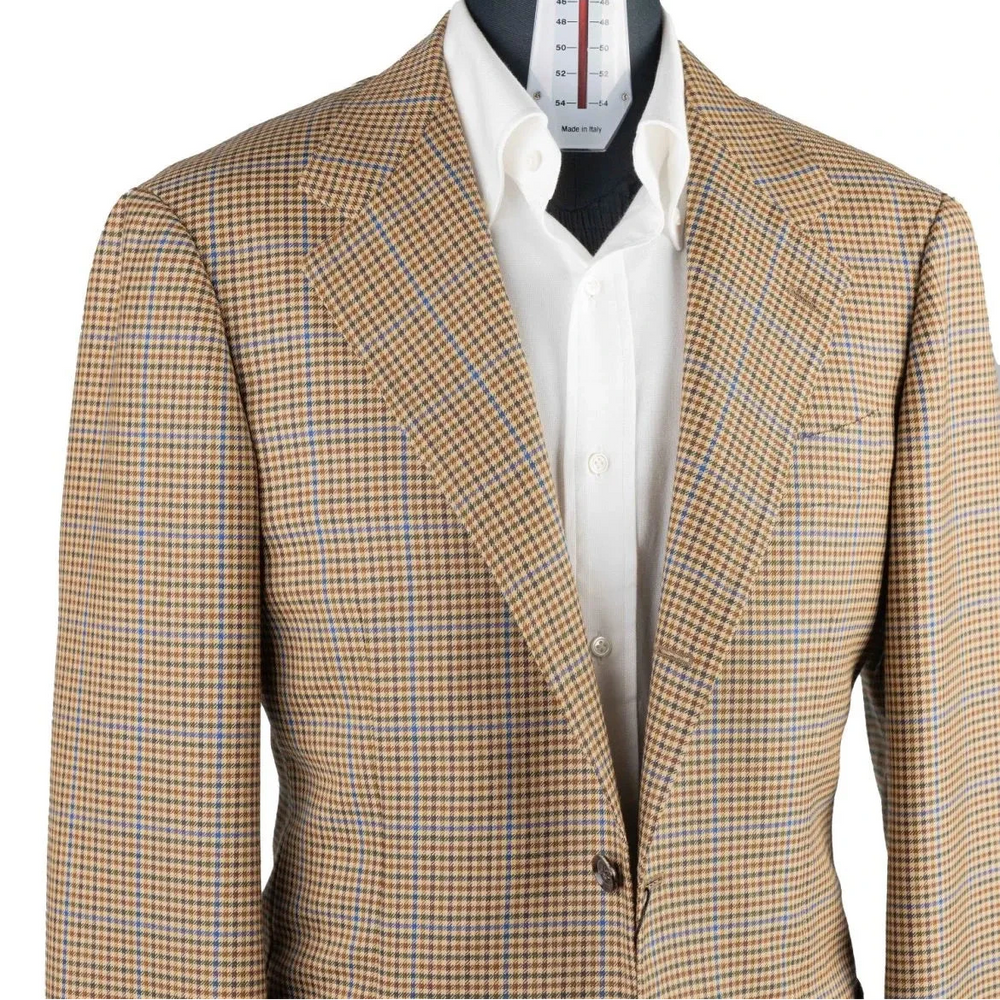 Close-up of the lapel on the RMJ-03 Gunclub Windowpane Jacket showing the lapel roll, edge stitching, and textured Moon & Sons wool pattern.