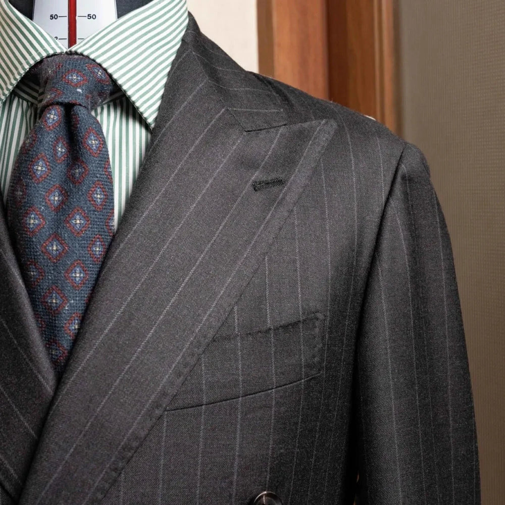 Front view of the RMJ-04 Chalk Stripe Charcoal Grey Jacket by Zegna Electa featuring the double-breasted design, peak lapels, and elegant chalk stripe pattern.