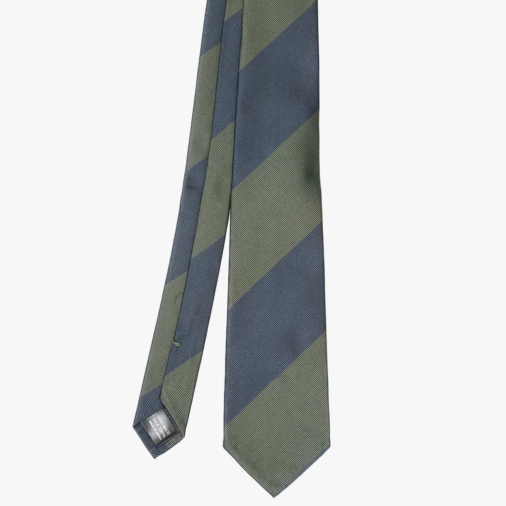 Front view of the Refinement block stripe neck tie in navy and green featuring bold diagonal stripe pattern and refined proportions.
