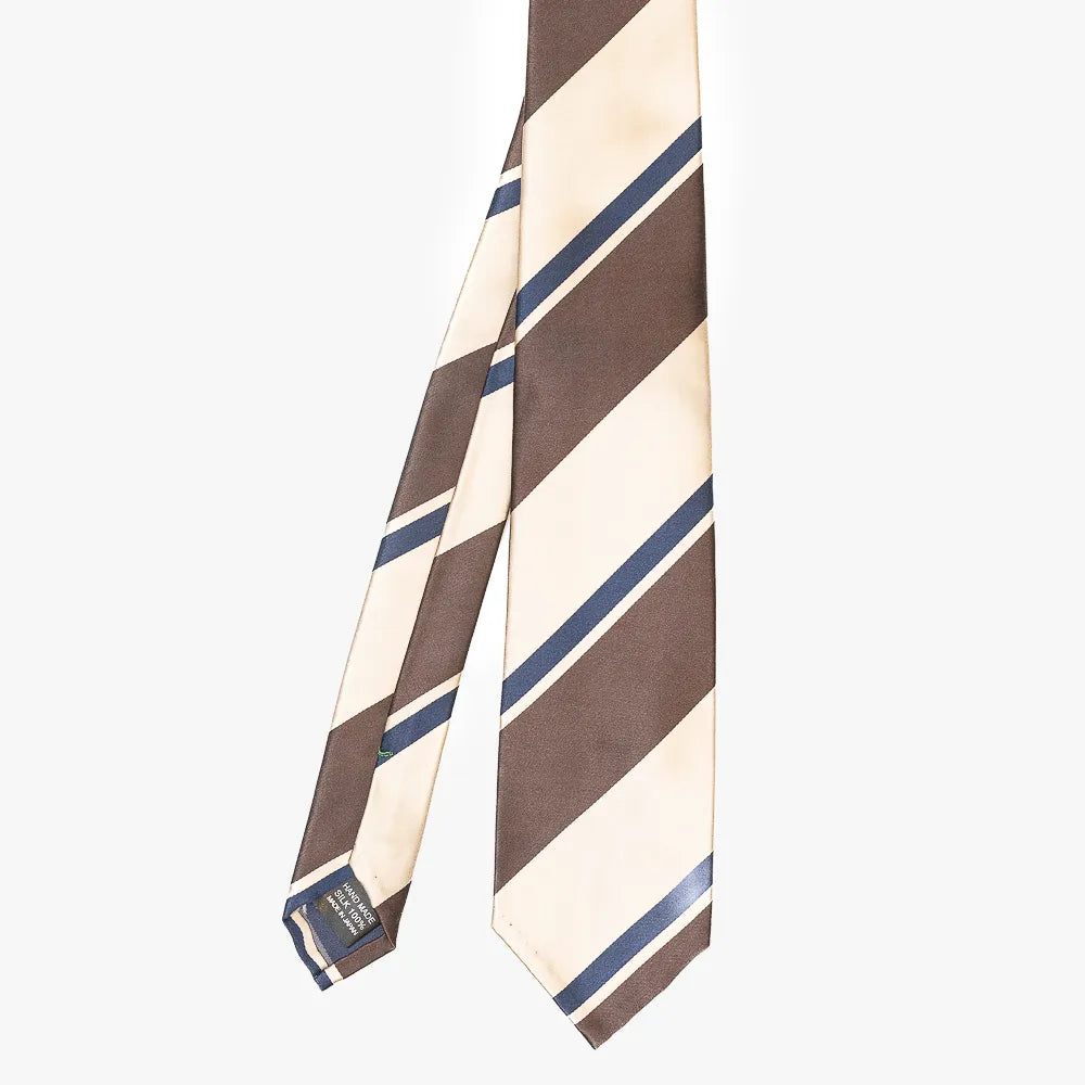 Front view of the Refinement stripe neck tie in navy and brown featuring a classic diagonal stripe pattern.
