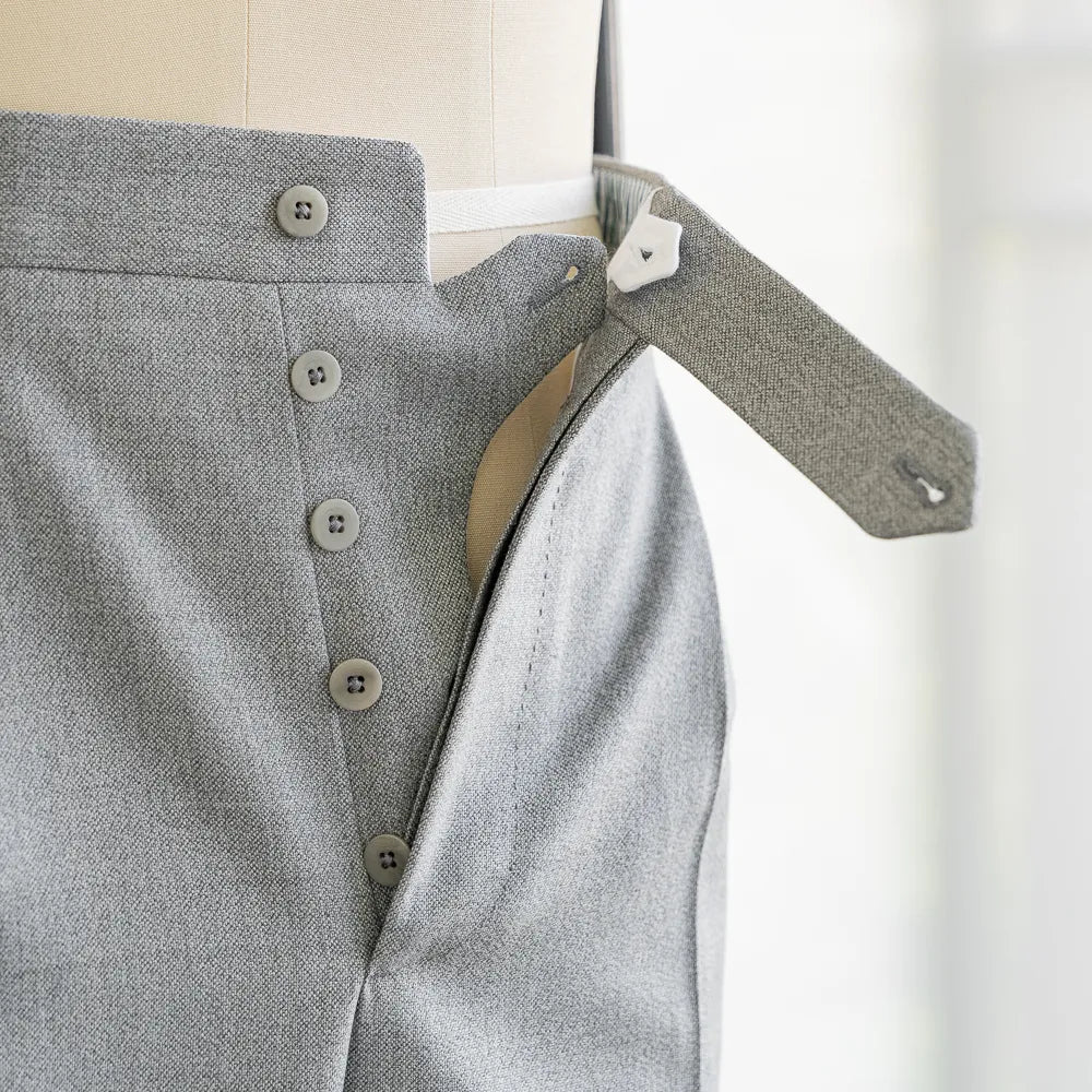 Close-up of the fly showing zipper, hook closure, and refined internal finishing.