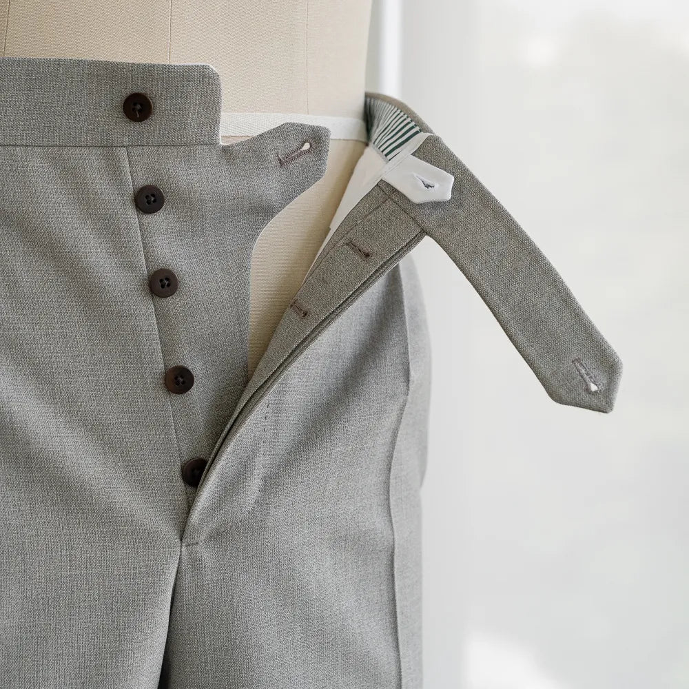 Close-up of the fly showing zipper, hook closure, and internal finishing.