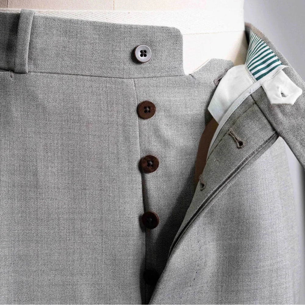 Close-up of the front pocket showing pocket curve, stitching detail, and refined finishing.