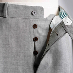 Close-up of the front pocket showing pocket curve, stitching detail, and refined finishing.