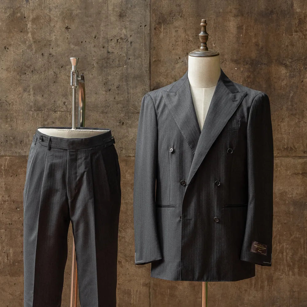 Full set view of the Refinement × Ring Jacket RMJ-04 Double Breasted Suit Herringbone Charcoal Grey by VBC showing the jacket and trousers together in a refined tailored silhouette.