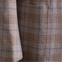 Close-up of the front pockets showing flap design, stitching accuracy, and perfect pattern matching.