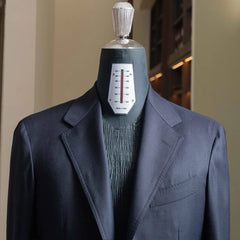 Close-up of the lapel and chest showing clean lapel roll and refined tailoring.