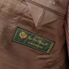 Interior close-up of the Loro Piana Summertime cloth label showing fabric origin and premium craftsmanship.