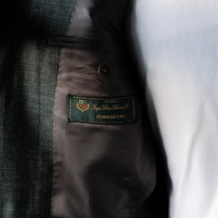 Interior close-up of the Loro Piana Summertime fabric label showing cloth origin and premium craftsmanship.
