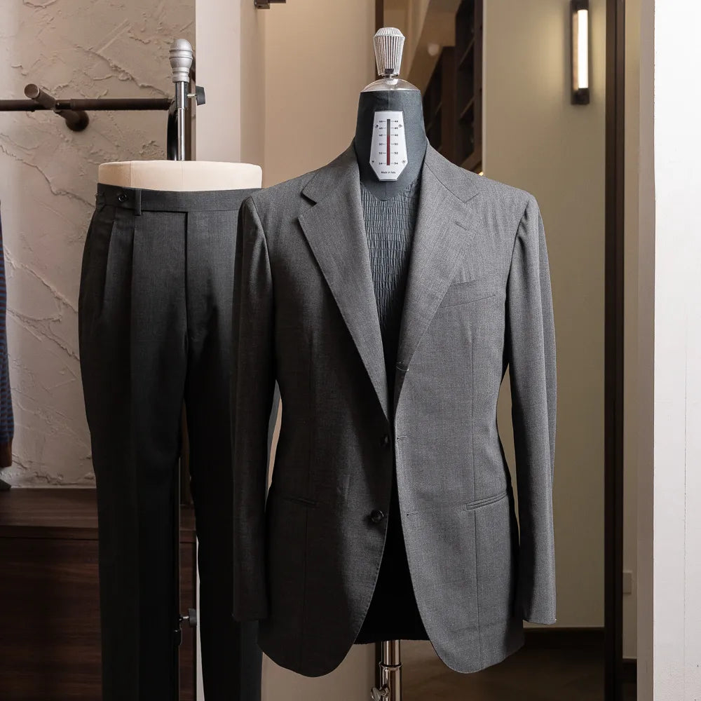 Full view of the Refinement Tailoring Rfmt-01 Suit in grey by Woodhead featuring a soft structured silhouette with matching trousers.