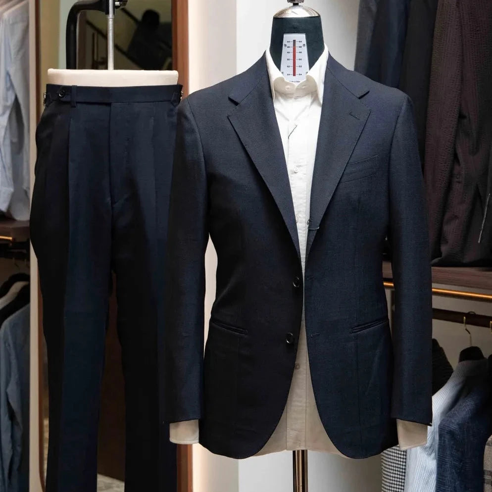 Front view of the Refinement Tailoring Rfmt-01 Suit Navy by Woodhead showing the refined silhouette, structured shoulders, and clean navy wool drape.