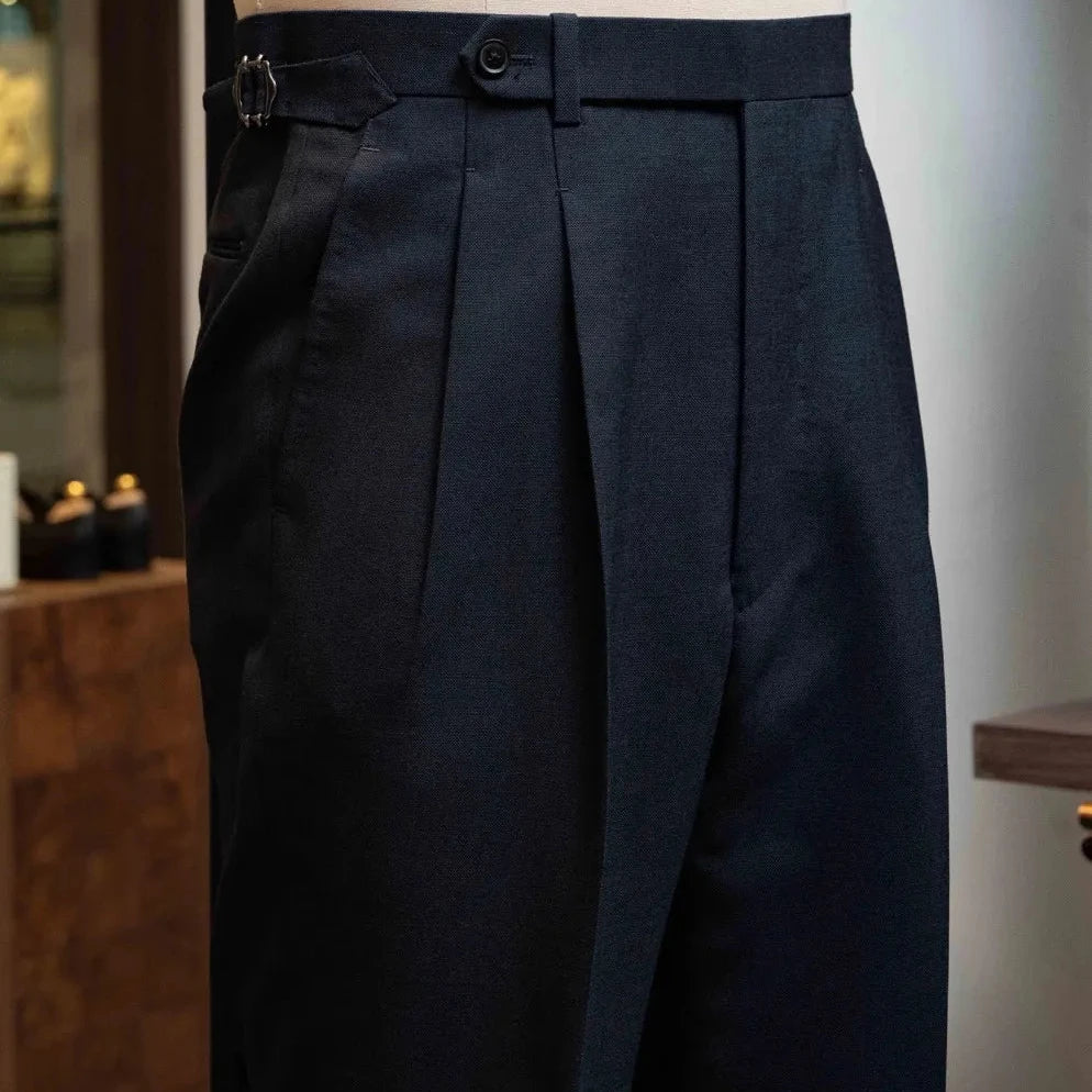 Front view of the suit trousers showing clean front construction and refined tailoring.