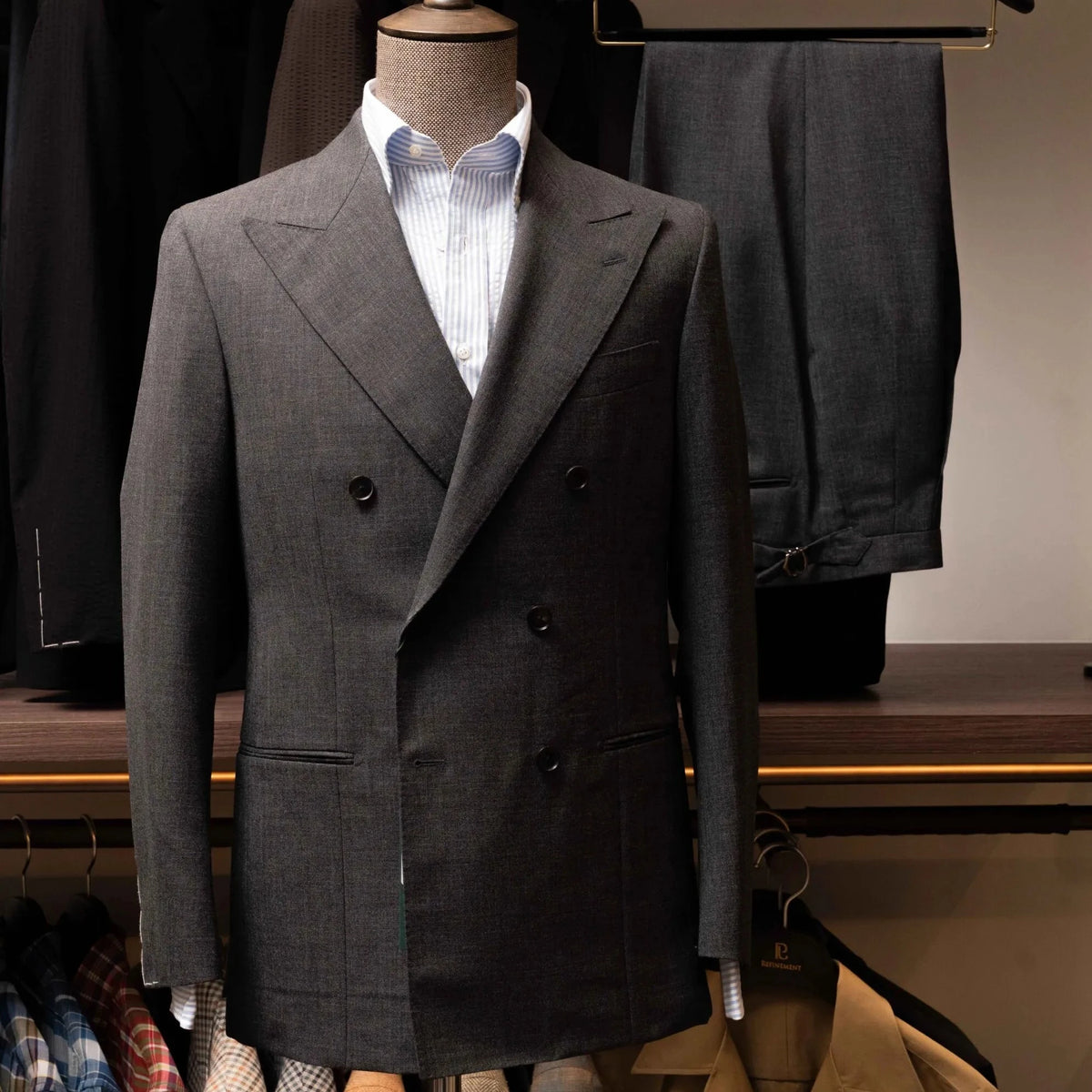 Front view of the Refinement Tailoring Rfmt-02 Double-Breasted Suit Jacket Mid Grey by Woodhead showing the structured silhouette and classic six-button DB layout.