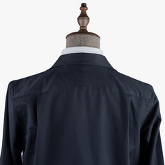 Back view highlighting the smooth navy fabric, clean back panel, and refined Shirt Blouson construction.