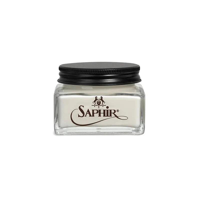 Front view of Saphir Renovateur Cream showing the iconic glass jar and classic navy-and-gold label design.