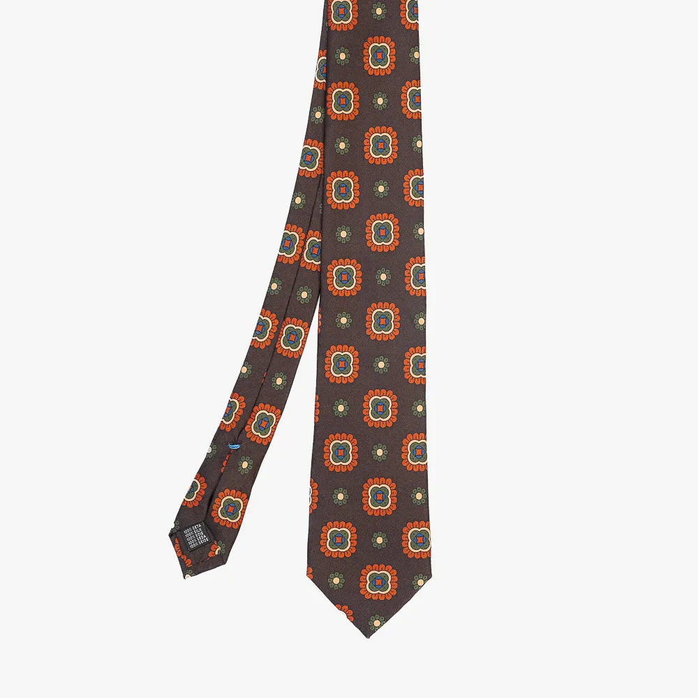 Full view of the Stefano Cau floral tie in brown showing the refined floral pattern and elegant proportions.